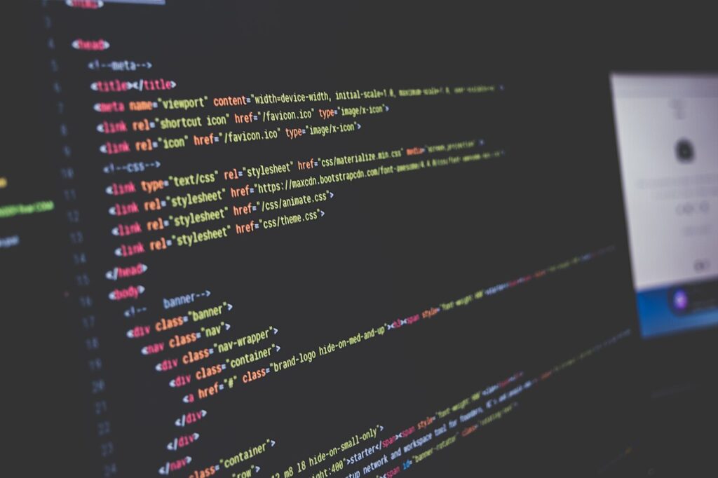 Lines of colourful code on a dark computer screen